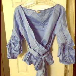 Light blue top with puffy sleeves